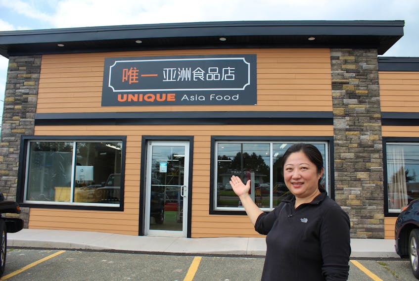 Grace Li, owner of Unique – Asia Food, in front of her new store in Summerside. She hopes the business will fulfill some of the local need for food supplies from other parts of the world.