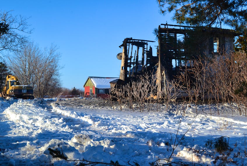 A vacant house in Bloomfield, already slated for demolition, went up in flames Monday night and Wet Prince RCMP is investigating the cause.