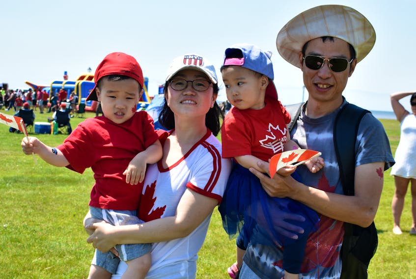 Eason Fan, from left, Fiona Liu, Mae and Zheng Fan immigrated from China to P.E.I. six years ago on Canada Day.