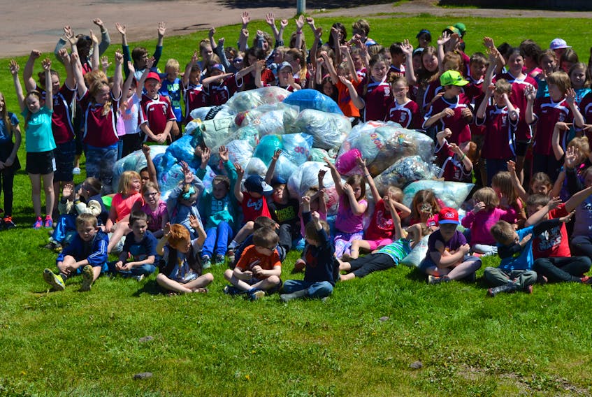 O'Leary Elementary School students displaying the mound of plastic carry-out bags they collected during Environment Canada 2017 Plastic Bag Challenge.
