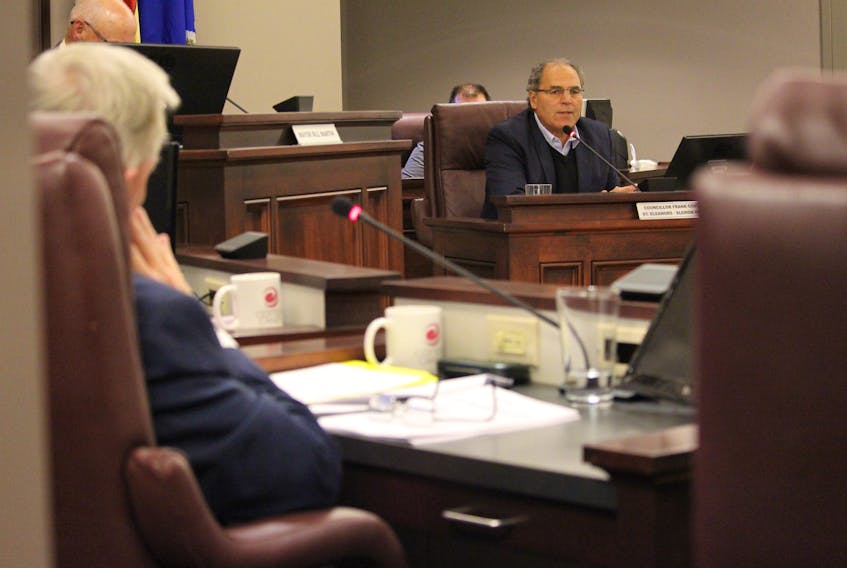 Summerside City Coun. Frank Costa, centre, voices his concerns about waiting to make a decision on the Kore Energy generator debate and saying he has doubts that a green option with the equivalent solution is out there.