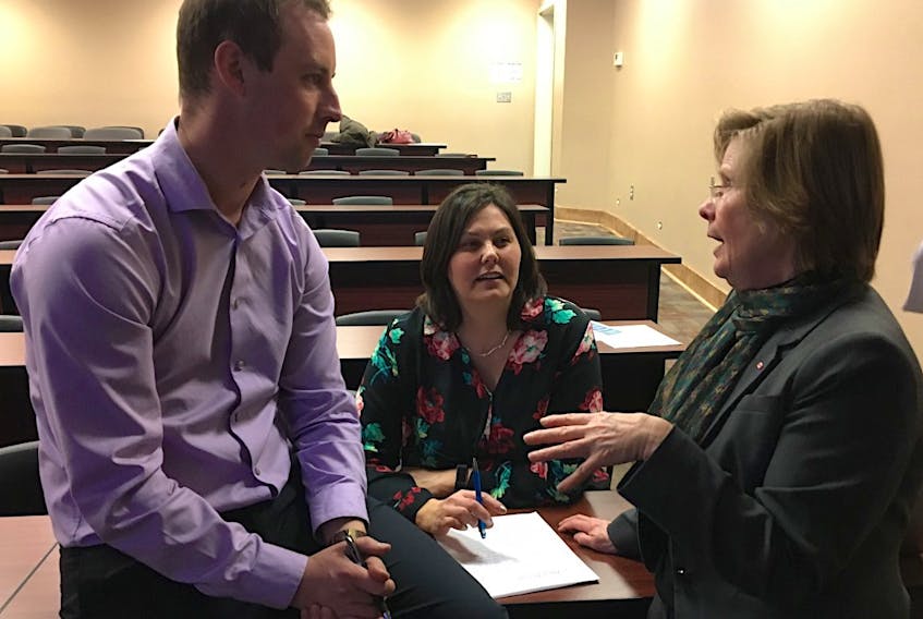 West Prince Chamber of Commerce president, Geoffrey Irving, and the chamber’s executive director, Tammy Rix, center, chat with guest speaker Pat Uptegrove, following the organization’s annual meeting.