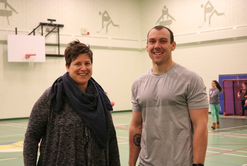 Karen LeBlanc, left, principal of École-sur-Mer and Mitchell Caissy, the school’s phys-ed teacher are excited about the possibilities the recent funding announcement means for the school.