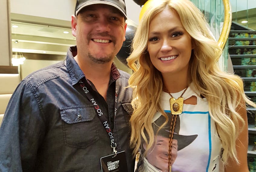 Woodstock singer-songwriter Cory Gallant posing with the Canadian Country Music Awards’ female artist of the year, Meghan Patrick, one of the many stars he met in Hamilton.