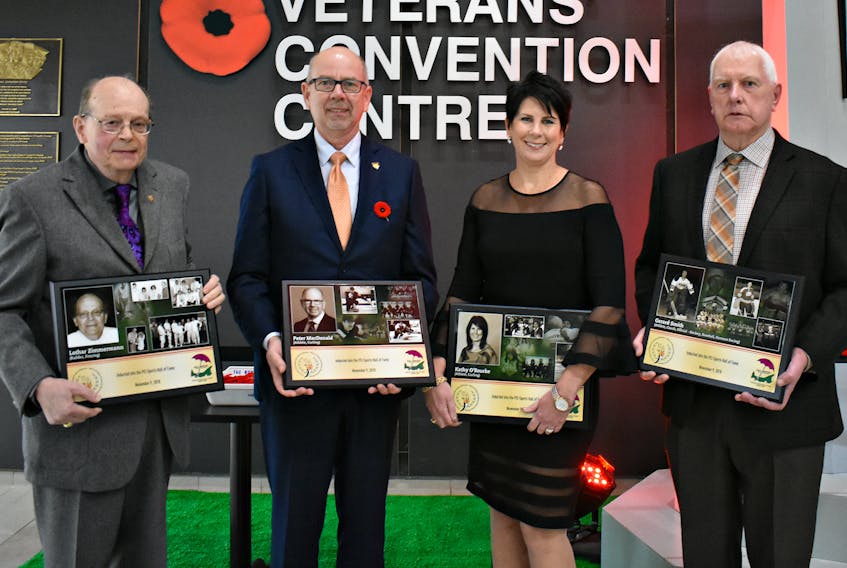 P.E.I.’s Sports Hall of Fame inductees this year: Loather Zimmermann, the founder of fencing on the province, from left, Peter MacDonald, and his sister Kathy O’Rourke, from the sport of curling, and the Island’s most notable figures in baseball, hockey and harness racing Gerard Smith.