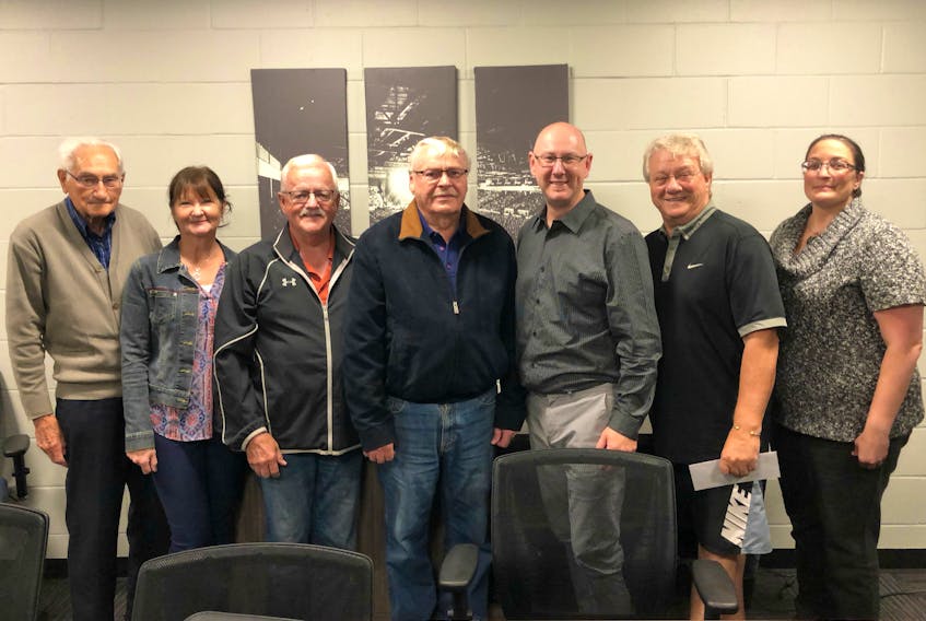 Vance Bridges, from left, Glenna Lohnes, Lion Cleve Rix, Lion George Lecky, Reverend Cory Somers, Lion Don Reid (chairman), and Nancy Beth Guptill. 
Missing: Katharina Mueller, Mayor Bill Martin, Lion Edwin Gallant, Kin Eric Ferrish, Lion Robbie Burt, and Y’s-men Ron Perry (vice chairman).