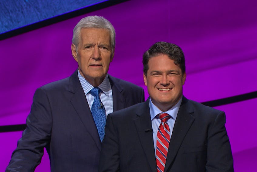 Jonathan Greenan, right, with TV game show host Alex Trebek, of “Jeopardy.” Greenan, who grew up in Summerside, filmed an episode of the show in August and it will air on Nov. 2.