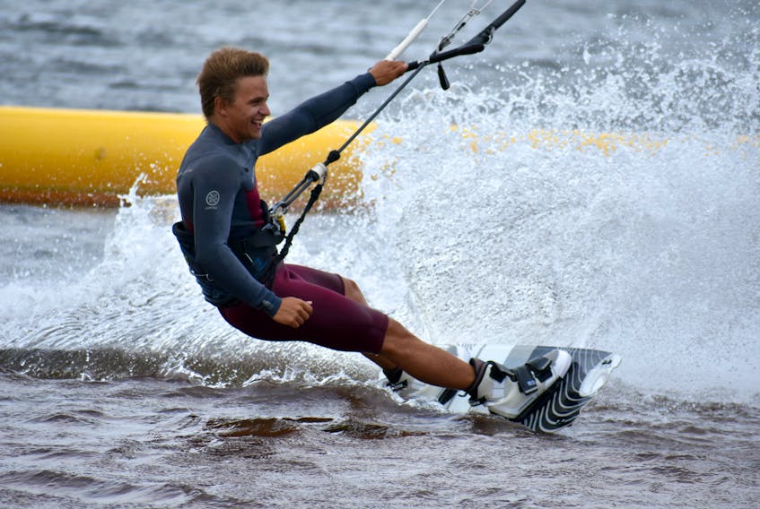 Freestyle kiteboarder Lucas Arsenault slices through the water at Malpeque Bay.
