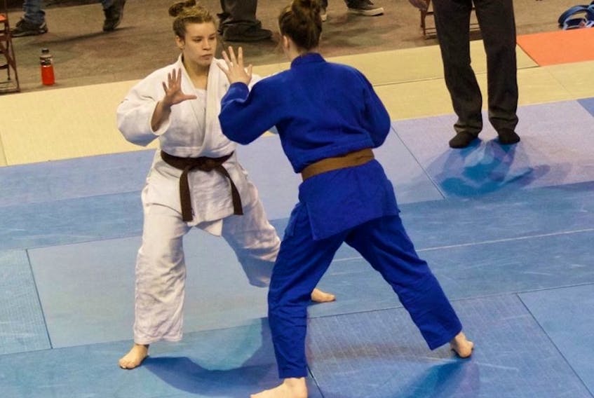 Karlyn Shea, left, and Loren Enman competing in the U21, 70kg class at the Atlantic Judo championships in Summerside in March. Shea went on to win gold in the competition which saw both Lennox Island athletes move up an age class and Enman a weight division. Enman will fight in the U18, U63 kg class and Shea will fight in the U18, Under-70 at Judo nationals this week in Calgary.