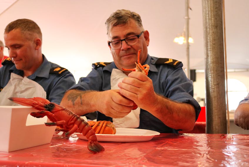 Mike Gallant, crew member of the HMCS Summerside, didn’t win the Summerside Lobster Eating Contest, but he did enjoy the lobster.