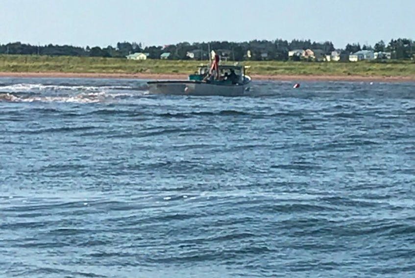 A mussel boat working for P.E.I. Aqua Farms got stuck trying to navigate the Malpeque Harbour channel Monday morning. One of its sister vessels got stuck and swamped in the same channel only four days ago.