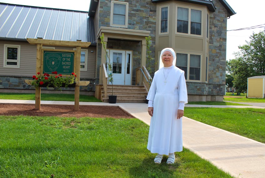 Sister Margherita Ianni outside her new home on Granville Street in Summerside.