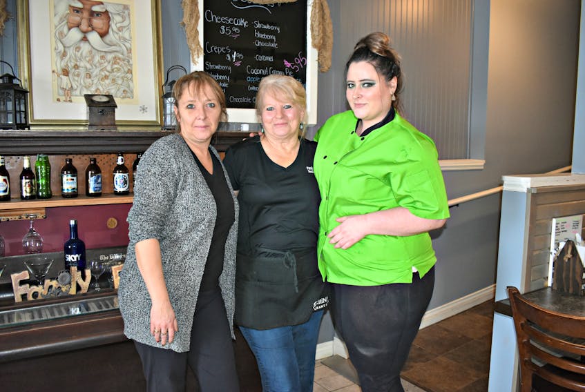 Charlene Gill, from left, with staff Lillian Gunter, and cook Nicole Pauptit.