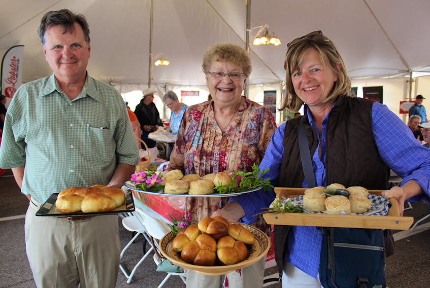 Betty, centre, and Dan MacEachern, not shown, entered the Summerside Lobster Carnival’s annual biscuit and roll competition, Thursday, along with their daughter Mary, right, and son-in-law Victor.