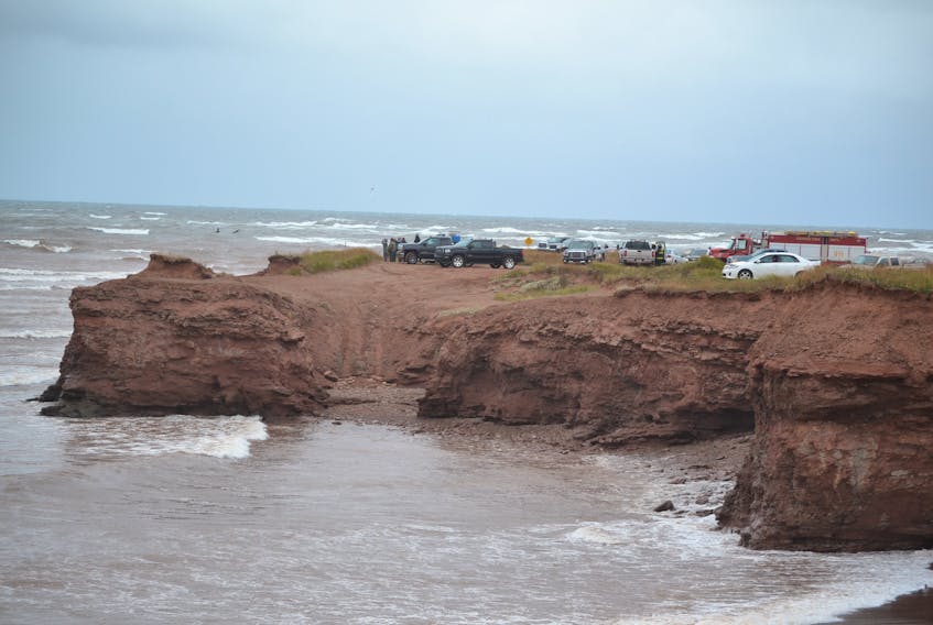 Tignish and area residents gathered all along the cliffs at North Cape Wednesday, hoping two missing fishermen will be found.