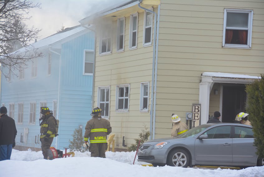 Summerside firefighters responded to a house fire in Slemon Park Wednesday afternoon. A woman, three kids and a dog all escaped unharmed, but a cat did not survive.