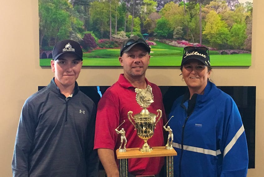 William Dorgan, from left, Mark Phillips and Lynn Dorgan won the junior, men’s and women’s titles respectively Sunday in the club championship tournament at St. Felix Golf Course. Phillips emerged as club champion following a one-hole playoff with Dorgan after both completed play at 73.