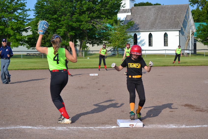 Jade Hackett gets herself in scoring position in beating the throw to third but her Tignish teammates couldn’t get her home and Kennebecasis Valley Dynamite won the U12 girls game 9-1.
