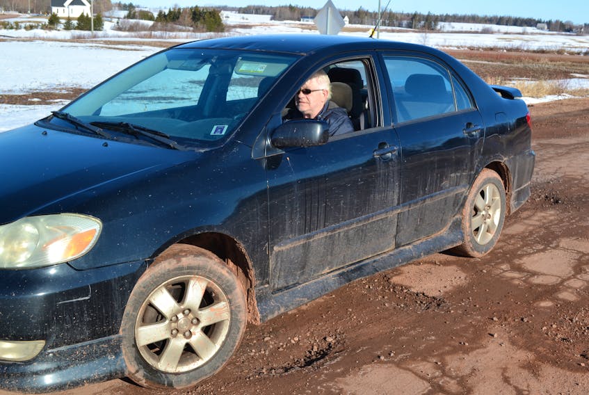 Brae resident Gerald McNally navigates his car around potholes in the Brae Harbour Road. The road placed seventh on the CAA Atlantic Worst Roads in Atlantic Canada campaign last year and is currently riding third in online voting for this year’s campaign.