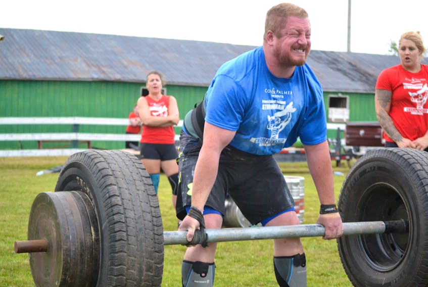 Mitch Kinch strains on his way to a second-place finish in the axle deadlift, and second overall, in the 2018 Strongest Man in P.E.I. competition.