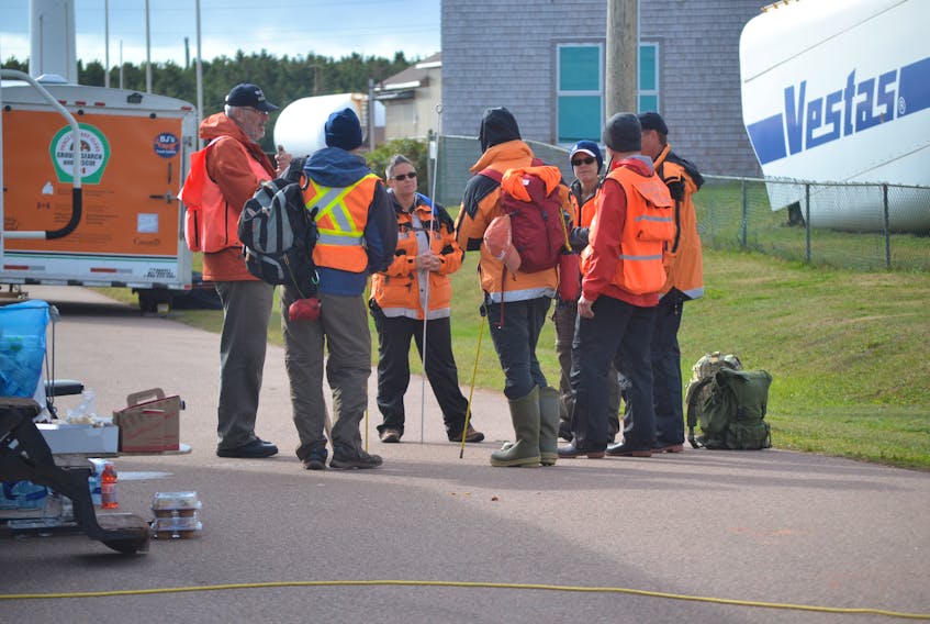 P.E.I Ground Search and Rescue members receive instructions before heading out for theier shift. A large number of PEIGSAR volunteers re at North Cape heling to lead the search for two fishermen missing since Tuesday.