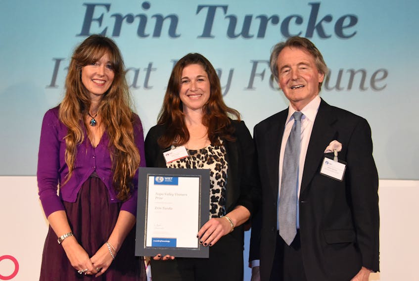 Award sponsor representative Emma Wellings, left, and WSET honorary president, Steven Spurrier, present the Napa Valley Vintners Prize to Erin Turcke, who achieved outstanding results across his diploma.