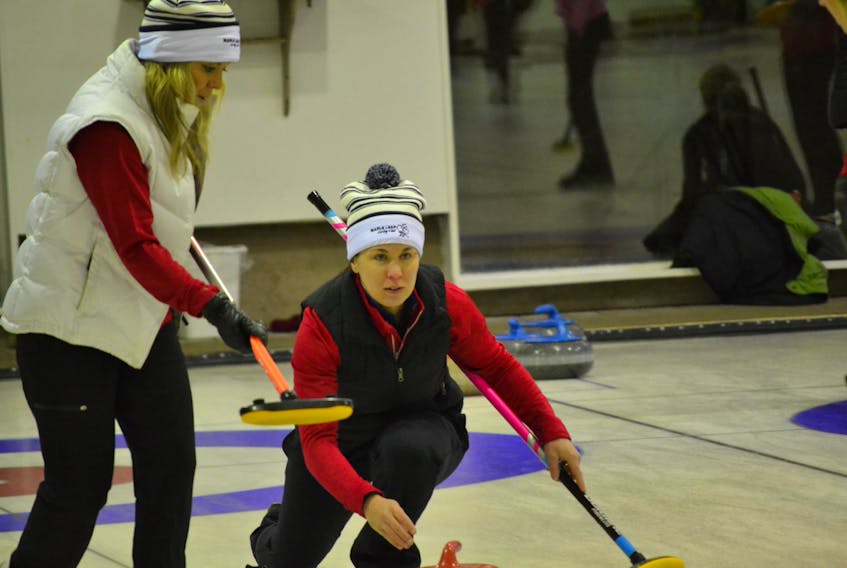 Sandra Jones, lead on the Bobbi-Jean Boylan rink from the Maple Leaf Curling Club, prepares to sweep her skips stone during P.E.I. Provincial Curling Club Championships’ round robin action in O’Leary. The host Maple Leaf women will play Melissa Morrow and her Silver Fox rink in the championship final today at 2 p.m.