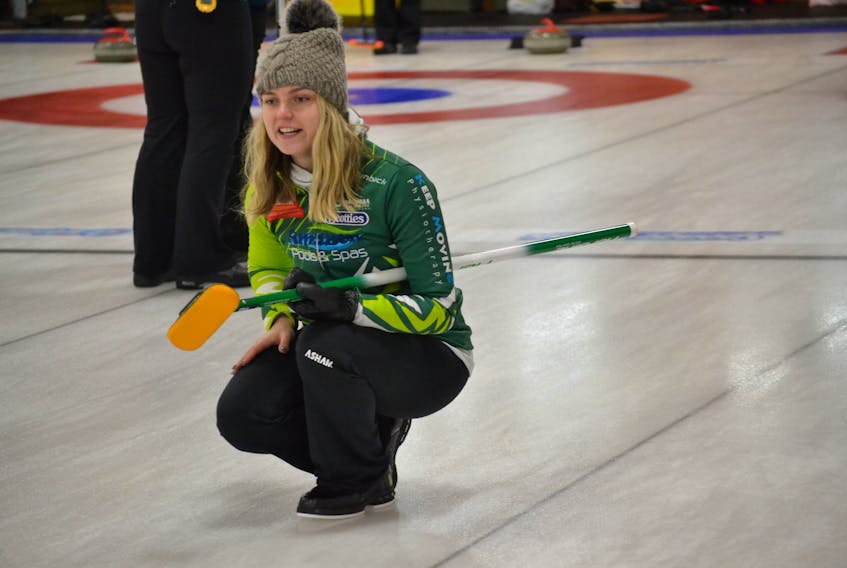Chloé McCloskey watches her rock during P.E.I. Scotties women’s curling action in Alberton. It’s her first time skipping at the Scotties. She kept her chances alive Friday morning, winning an elimination game 7-5 over Montague’s Tammy Dewar.