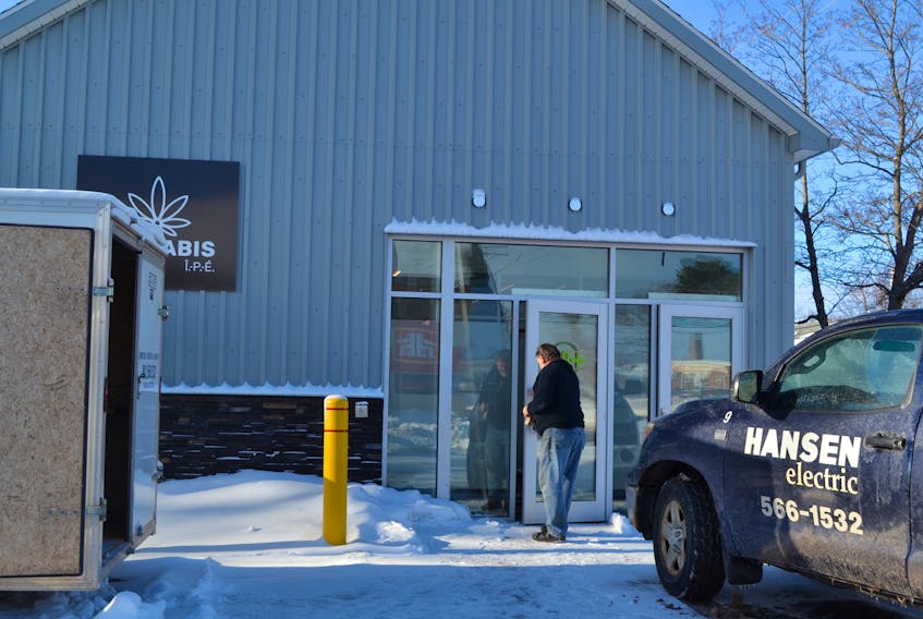 A construction worker arrives for work at the P.E.I. Cannabis Corporation’s O’Leary store. Contractors and subcontractors are wrapping up their fit-up in anticipation of a late January opening of the store. The store will open more than three months later than the other three corporate stores in P.E.I.
