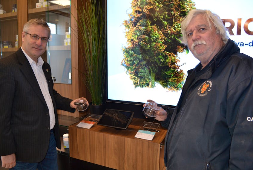 O’Leary-Inverness MLA Robert Henderson (left), and Eric Gavin, Mayor of O’Leary, examine products available for sale at the P.E.I. Cannabis Corporation’s O’Leary store. They participated in a tour of the store Wednesday. The corporation is leasing its corporate space in a new building put up by the Town of O’Leary. The store opens for business Friday at 9 a.m.