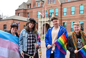 Rory Starkman of the P.E.I. Transgender Network, left, Kandace Hagen, Andy Glydon of Pride P.E.I.  and Kels Smith were in Summerside for the flag raising in honour of the International day against homophobia, transphobia and biphobia and the 50th anniversary of the partial de-criminalization of homosexuality.
