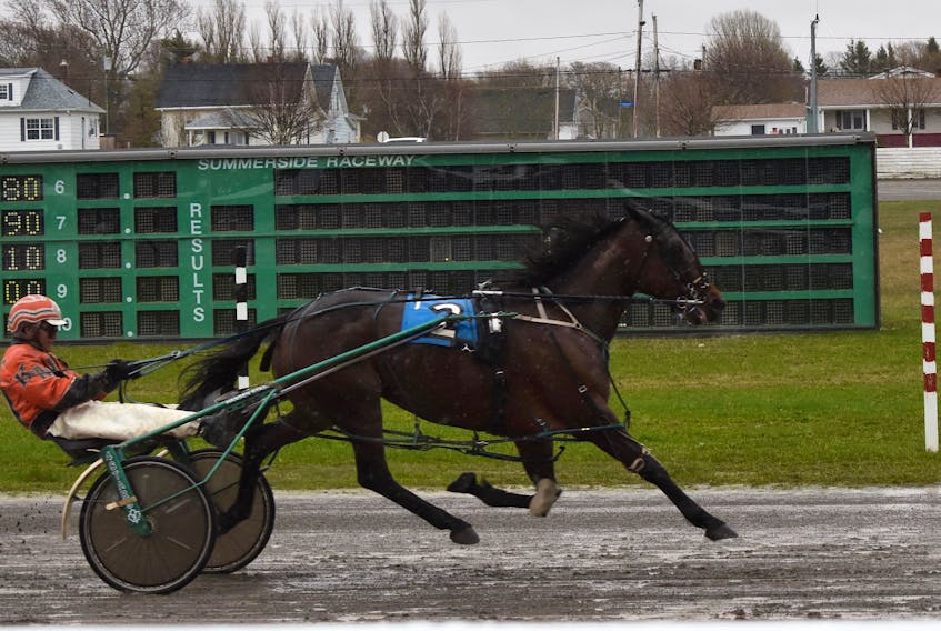 One Hot Camshaft driven by Ken Murphy crosses the finish line to win the first race of the season Monday at Red Shores at the Summerside Raceway. The track was “sloppy” and there was a two-second variant.
