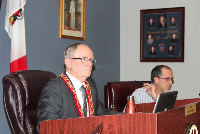 Kensington Mayor Rowan Caseley listens to the town’s CAO Geoff Baker discuss the issues at the Jan. 14 council meeting.