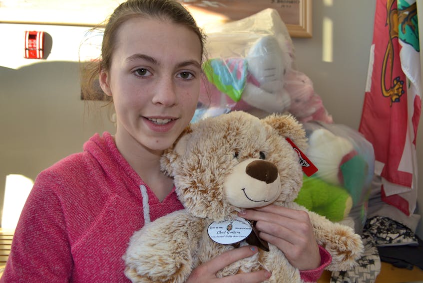Jasmyn Coughlin displays one of the 253 teddy bears her family collected this year in memory of her father. The supply was dropped off to the West Prince RCMP detachment on Monday, the 13th anniversary of her father’s death. In the 12 years that the Chad Gallant Memorial Teddy Bear Drive ran, more than 3,600 teddy bears were dropped off to the RCMP and other first responders to present to children they encounter during trying circumstances.