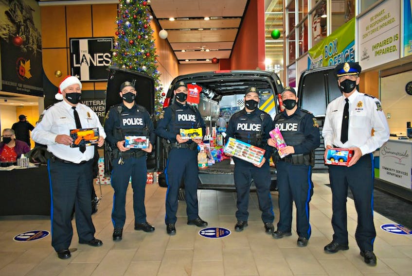 Summerside Police Services' Chief Dave Poirier, from left, Const. John Arsenault, Const. Colby Landrigan, Const. Jesse McCabe, Const. Gino Scichilone, and Deputy Chief Sinclair Walker took part in the recent Cops for Christmas Toy Drive in Summerside.