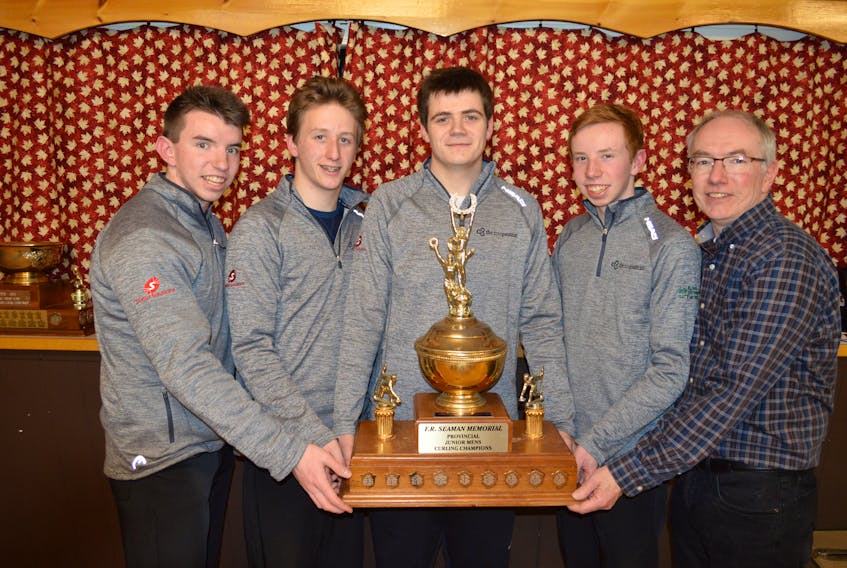 Skip Alex MacFadyen, from left, James Dalton, mate; Leslie Noye, second stone; Parker MacFadyen, lead, and coach David MacFadyen from the Silver Fox in Summerside won the team’s first Pepsi P.E.I. junior men’s curling championship at the Maple Leaf Curling Club in O’Leary on Friday night.