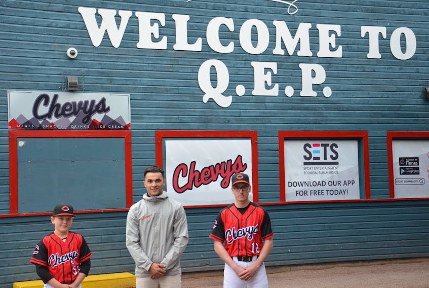Summerside Area Baseball Association (SABA) will host its annual Opening Day on Sunday. From left: Summerside mosquito AAA player Aaden Campbell, SABA president and general manager Tanner Doiron and Summerside midget AA player Kalib Snow discuss Opening Day in the courtyard of Queen Elizabeth Park.