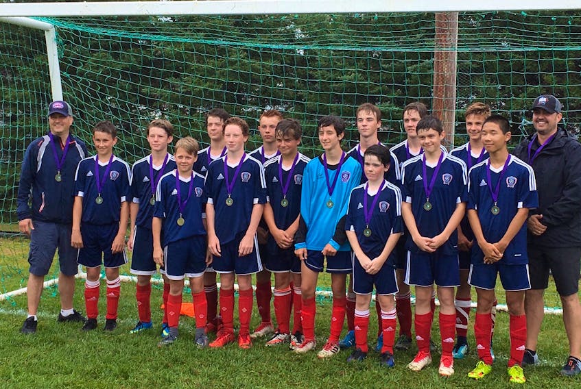 The Summerside United captured the Under-15 Boys First Division championship at the Central Queens soccer tournament on Sunday afternoon. Members of the United are, front row, from left: Phillip Sullivan (assistant coach), Frederick Morency, Rankin Noye, Liam Sullivan, Xavier Dalton, Brady Corkum, Evan Hume, Campbell Pomeroy, Evan Aylward and Jason Bai. Back row: Connor Moore, Keiran Arsenault, Reilly Goeseels, Cole Hemphill, Nico Durant and Ron Aylward (coach).
