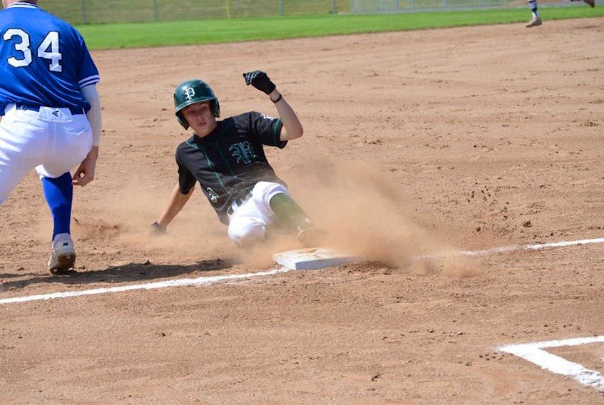 Noah Duckworth slides into base during action at the 2018 Canada Cup in Moncton, N.B., in August. Sandy Foy Photo.