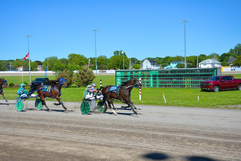 The Marc Campbell-driven Rose Run Quest, 2, edged out Do Over Hanover and driver Jason Hughes and Bugsy Maguire, 4, steered by Myles Heffernan, in the second of two $5,000 Township Chevy and Noonan Petroleum Governor’s Plate eliminations at Red Shores at Summerside Raceway on Sunday afternoon. Time of the mile was 1:54.1.