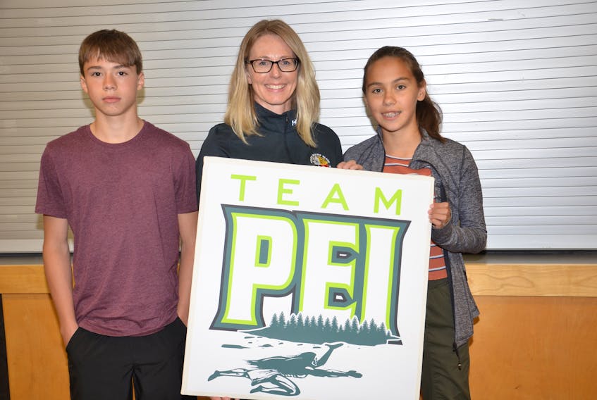 Team P.E.I. chef de mission Lynn Anne Hogan, centre, discusses this week’s Atlantic Indigenous Games in Halifax, N.S., with athletes Kavon Bernard and Madison Brown.
