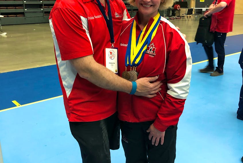 Natasha Dunn Kvedaras and her husband and training partner, Aras Kvedaras, at the International Powerlifting Federation’s world championships in Sweden last week.
