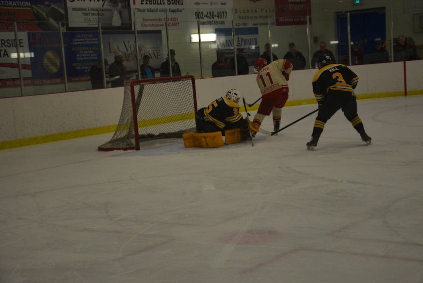 Sherwood-Parkdale Metros goaltender Sam Walsh stopped the Western Red Wings’ Jason Gallant on this first-period scoring chance in Game 3 of the best-of-seven Island Junior Hockey League final series. Walsh made 43 saves in the Metros’ 4-3 win in Abram-Village on Friday night.