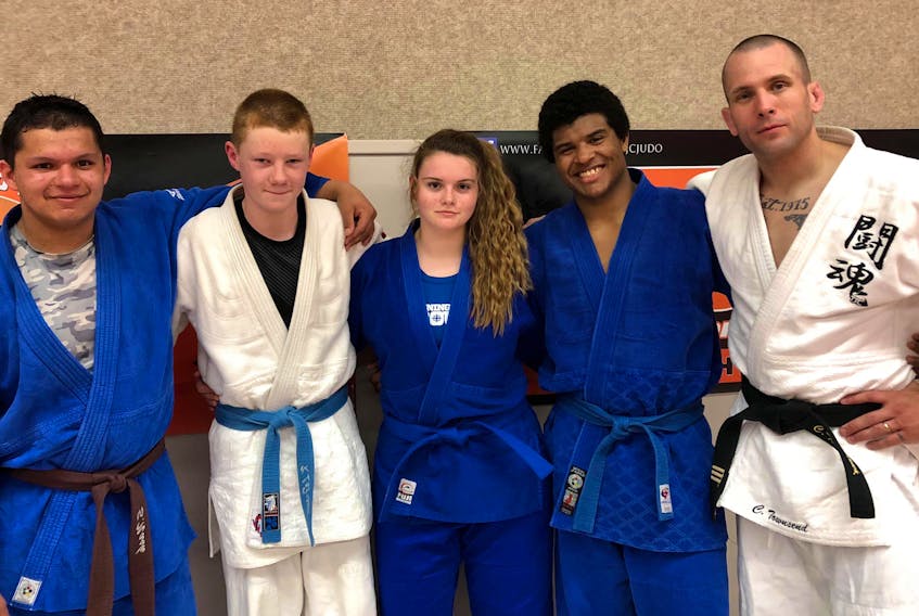 Six members of the Toshidokan Judo Club (TJC) in Summerside are headed to the national open championships in Calgary this week as part of Team P.E.I. From left: Sebastian Nash, -90 kilograms, under-18; Kris Lafrance, -60 kilograms, under-16; Ellen Gillis, +70 kilograms, under-18; George Madumba, -90 kilograms, under-18, and coach Chris Townsend Missing from photo is coach Tracey Gallant.