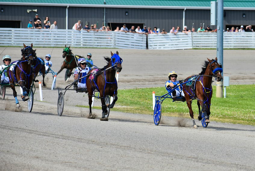 Kenny Arsenault drove Czar Seelster, left, to a 1:54 win in the second $5,000 Governor’s Plate elimination at Red Shores at Summerside Raceway on Sunday. The Austin Sorrie-driven and Walter Simmons-owned In Spades, right, came second while Jason Hughes steered defending-champion Do Over Hanover, centre, to the show position. The 50th running of the Governor’s Plate, presented by Township Chevrolet, is scheduled for Saturday night.
