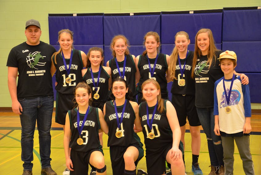 The Kensington Torchettes pose for a team photo after winning the girls’ championship in the second annual Aidan K. Harrington Memorial basketball tournament, hosted by Kensington Intermediate-Senior High School over the weekend. Team members are, front row, from left: Abby Christopher, Hillary MacLean and Nicole Boucher. Back row: Jake Reynolds (coach), Ellen Murphy, Victoria Bond, Emily MacDonald, Ellen Cole, Callie Champion, Brooke Johnston (coach) and Quinn Harrington, brother of Aidan Harrington.