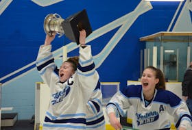 The emotion is etched in the face of Gracyn Handrahan as she hoists the Dalziel Cup after captaining the Western Wind to the 2018-19 P.E.I. Midget AAA Female Hockey League playoff championship at Credit Union Place’s Ice Pad on March 12. Also celebrating with Handrahan is assistant captain Paige Deighan. It marked the first provincial championship for Handrahan, who has been playing hockey since she was four.