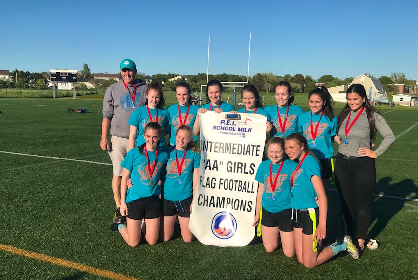 The Summerside Intermediate School Dolphins are the 2019 P.E.I. School Athletic Association AA girls’ flag football champions. Members of the Dolphins are, front row, from left: Lauren Clark, Katie Acorn, Chelsea Ellands and Destiny Arsenault. Back row: Rob Connell, Reghan Betts, Andrea Caron, Aidan Murphy, Paige MacLean, Brooke Blanchard, Callie McAlduff and Rebecca Proctor.