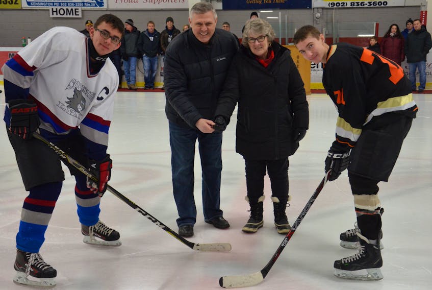 Kensington and Area Minor Hockey hosted the inaugural Dave Martin Memorial midget A hockey tournament Jan. 19 and 20. Martin’s wife, Jean, and Paul Montgomery dropped the puck for the ceremonial opening faceoff at Credit Union Centre in Kensington on Saturday. Southside Lynx captain Blake Hamill, left, and Kensington Junior Vipers captain Ben Dyment take the faceoff. Montgomery was team captain of the Martin-coached Kensington Compton Auto Body team that won the 1980-81 provincial midget C hockey championship. Martin’s son, Nick, and daughter, Kim, also attended the opening ceremony. Nick was the stick boy with the 1980-81 championship team.