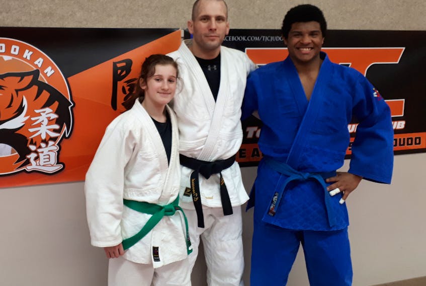 Toshidokan Judo Club sensei Chris Townsend, centre, was pleased with the recent gold-medal performances of Paige Walfield and George Madumba at the Atlantic judo championships. Bryce Doiron/Journal Pioneer